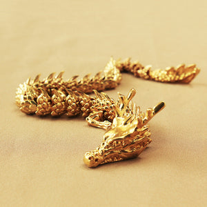 Dragon d'or aux articulations mobiles